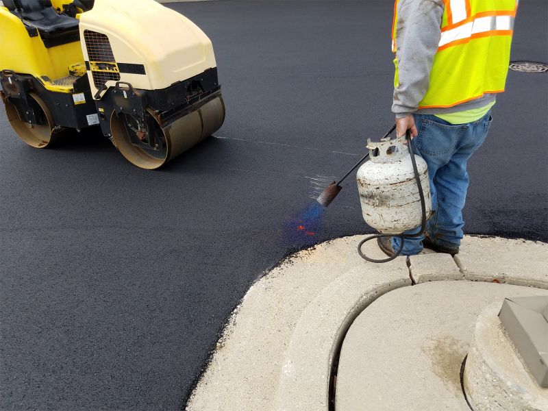 Local Asphalt Sealing pros at work